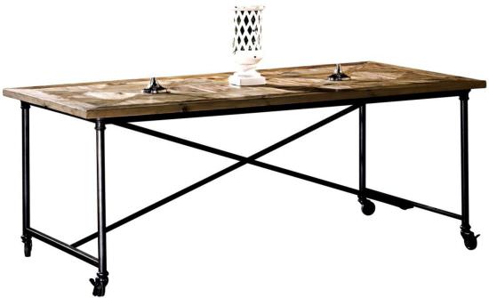 Ancienne table en pin et fer sur roulett